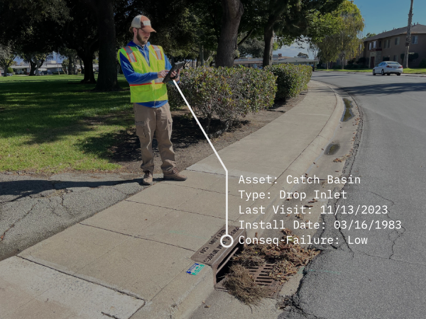 Catch Basin Inspection in Progress: Leveraging technology, a municipal field worker records crucial details on an iPad with 2NFORM for efficient and precise maintenance management.